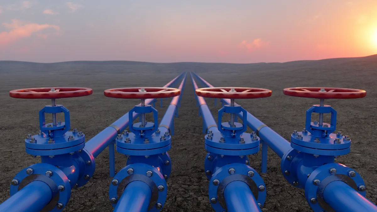 Oil Or Gas Transportation With Blue Gas Or Pipe Line Valves On Soil And Sunrise Background