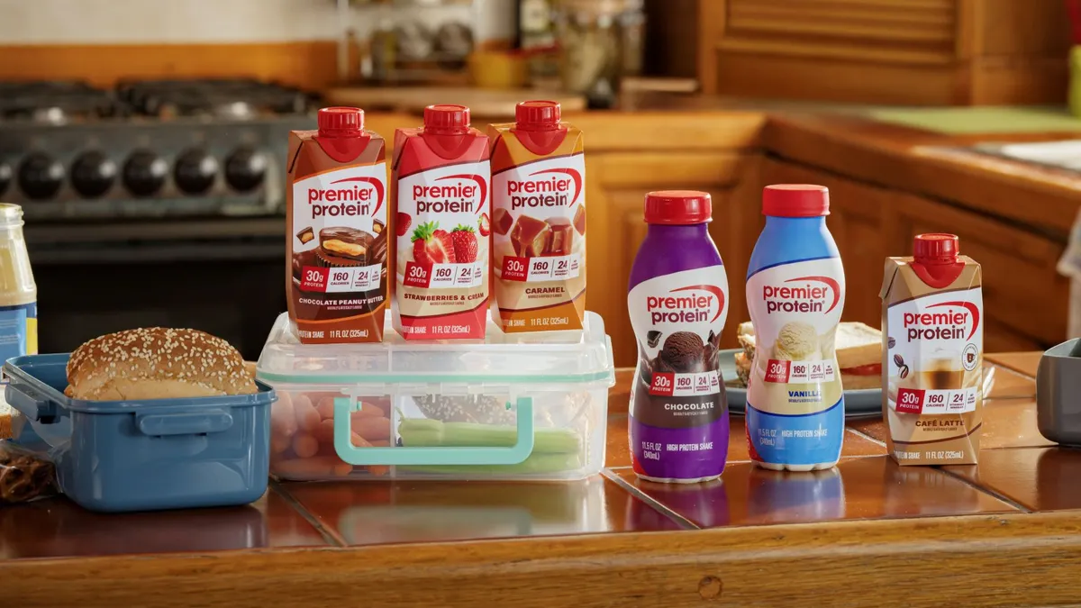 Premier Protein products are pictured on a kitchen counter.
