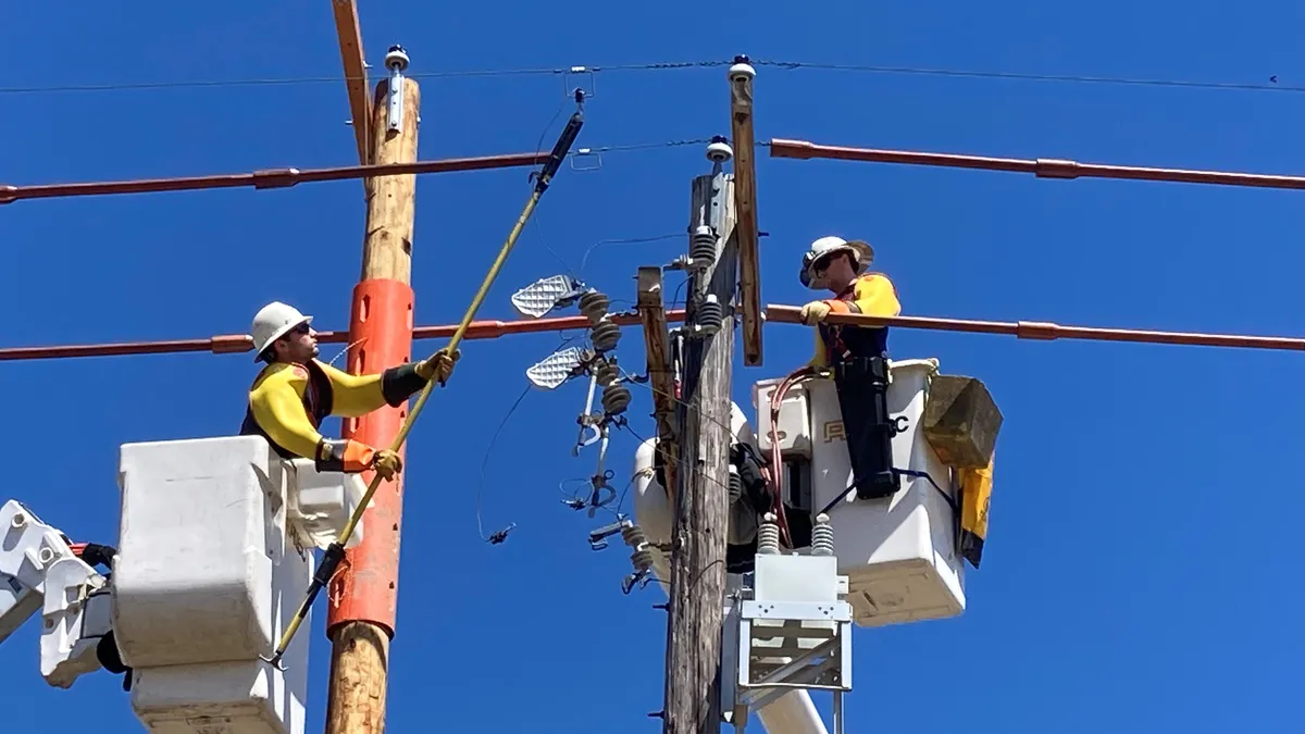 A FirstEnergy crew upgrades a power line in southern York County, Pennsylvania.