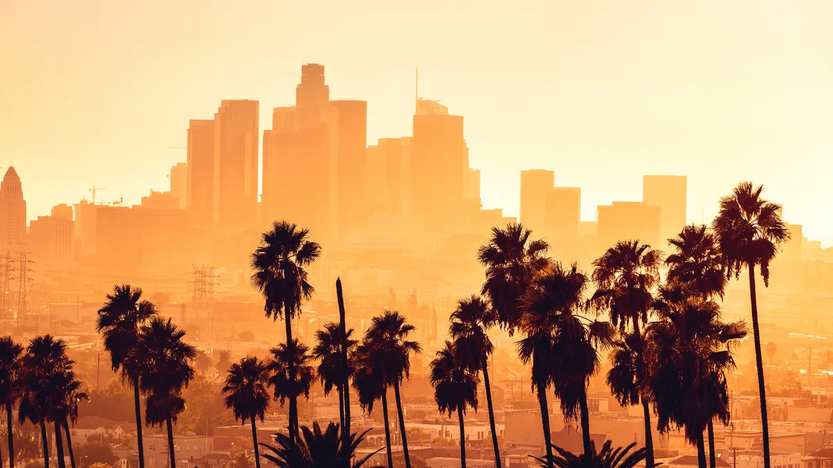 Los Angeles golden hour cityscape over downtown skyscrapers - stock photo