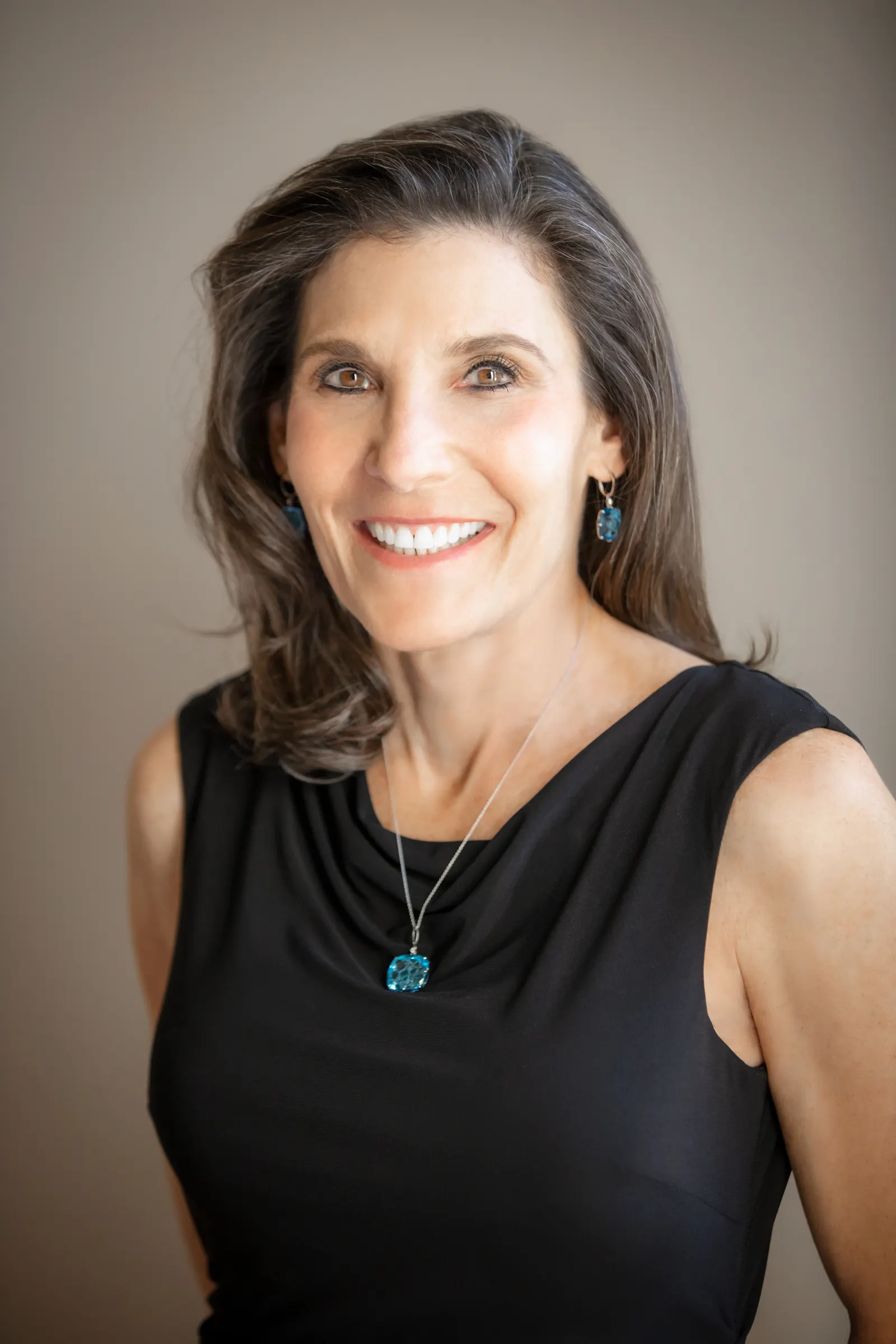 Beth Seidenberg of Westlake Village Partners poses for a photo against a neutral background.