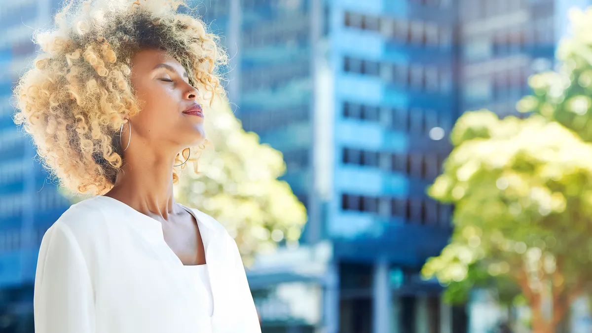 Black woman, relaxing, outside