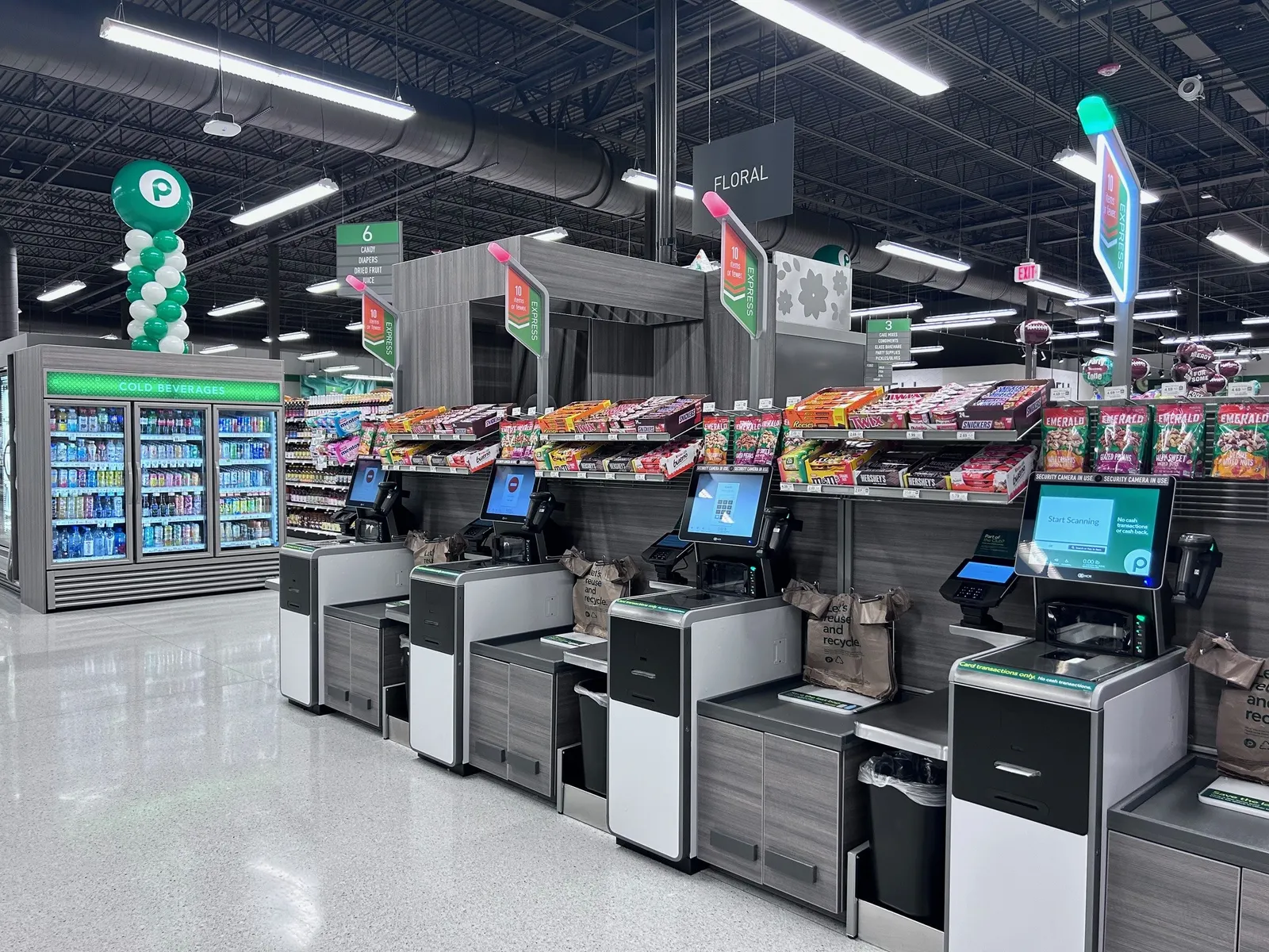 Self-checkout machines at a grocery store.