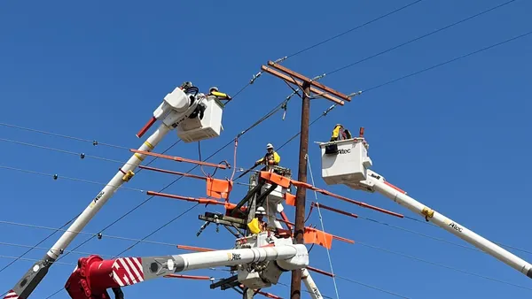A FirstEnergy crew working on distribution power lines.