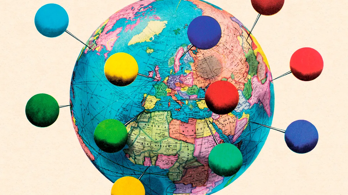 An illustration of a globe with large multicolored pins pointing to countries.