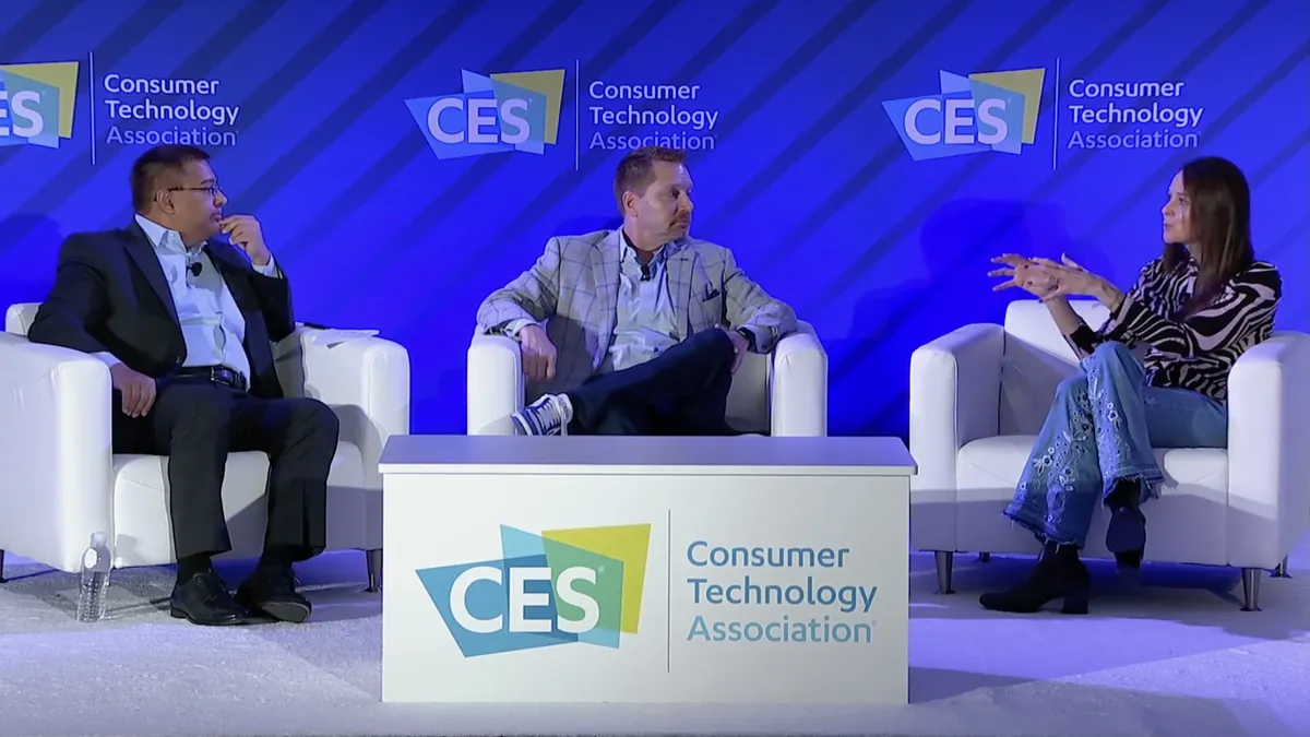 Rajeev Chand, partner and head of research at Wing Venture Capital, CrowdStrike CEO George Kurtz and CISA Director Jen Easterly (left to right) discuss cybersecurity challenges on a CES panel in Las V