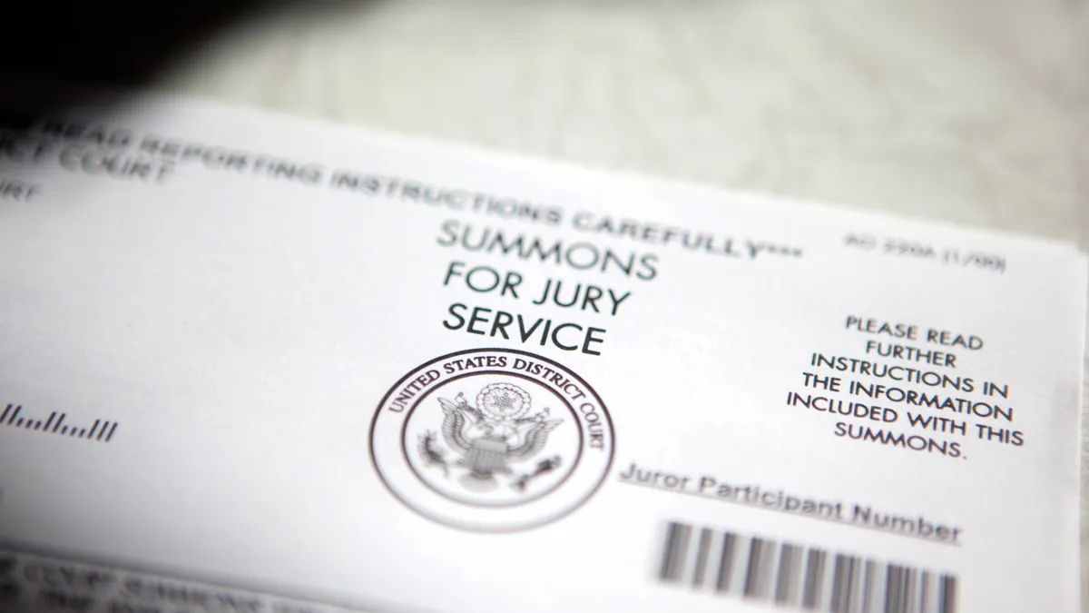 Summons for jury service in district court