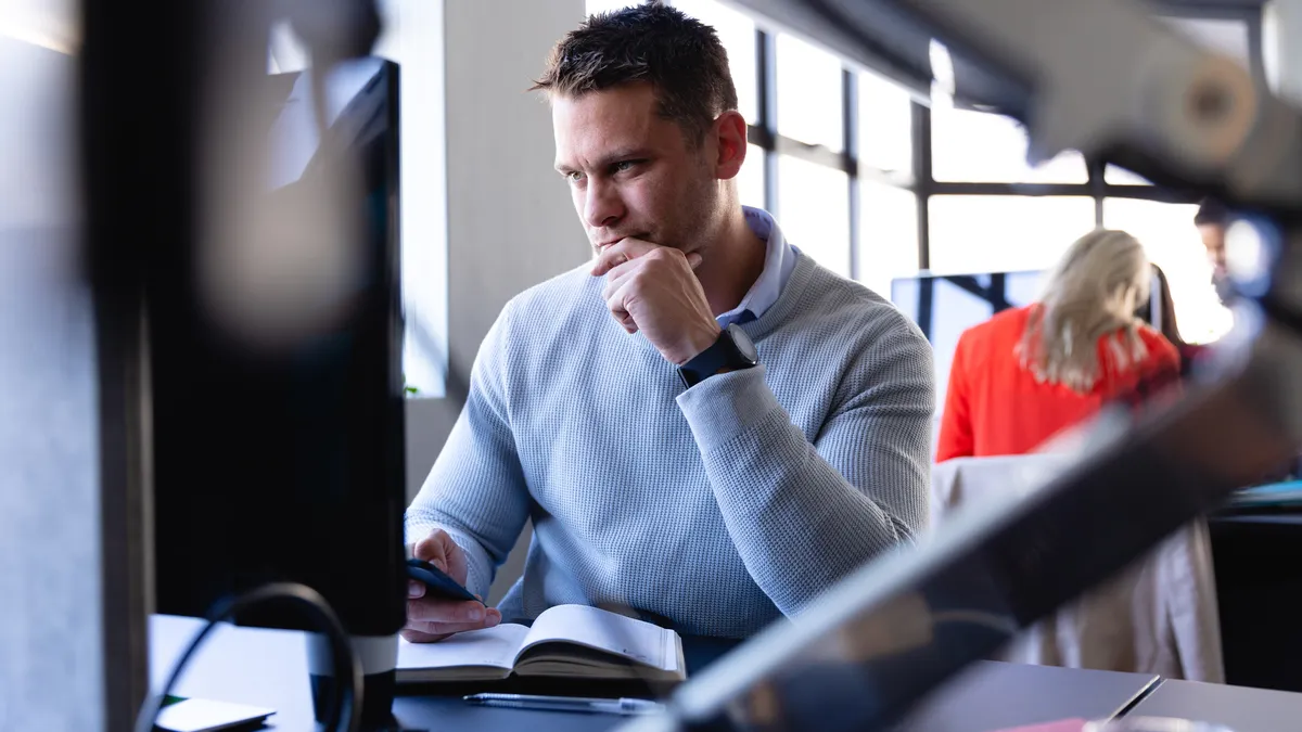 Caucasian man working in office