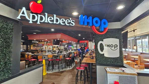An interior of a restaurant with signs that say Applebee's and IHOP