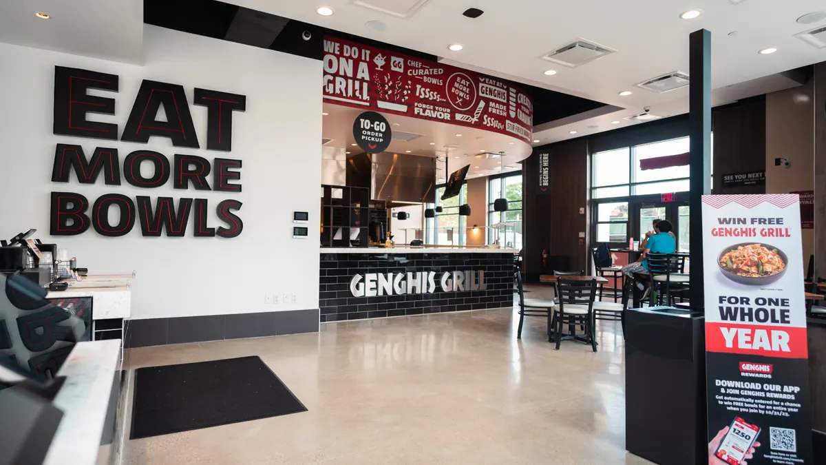 The inside of a Genghis Grill.