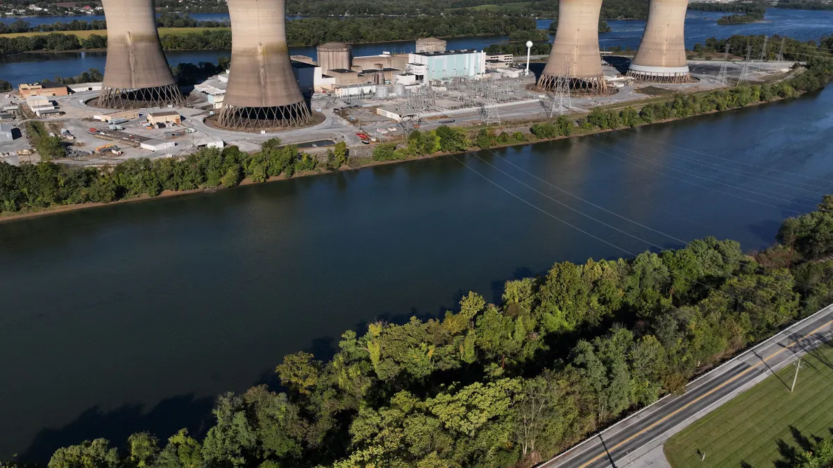 A nuclear power plant alongside a river.