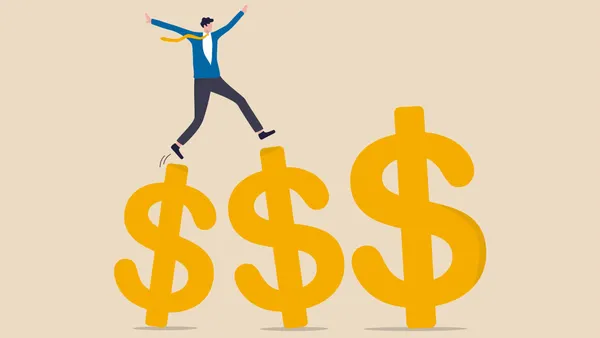 professional manager walking and jumping on growth golden dollar signs