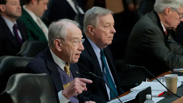 Sen. Chuck Grassley gestures as he speaks during a committee meeting.