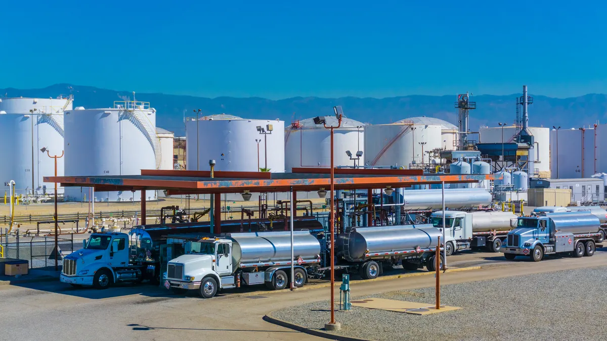 Fuel tanker trucks at refinery station