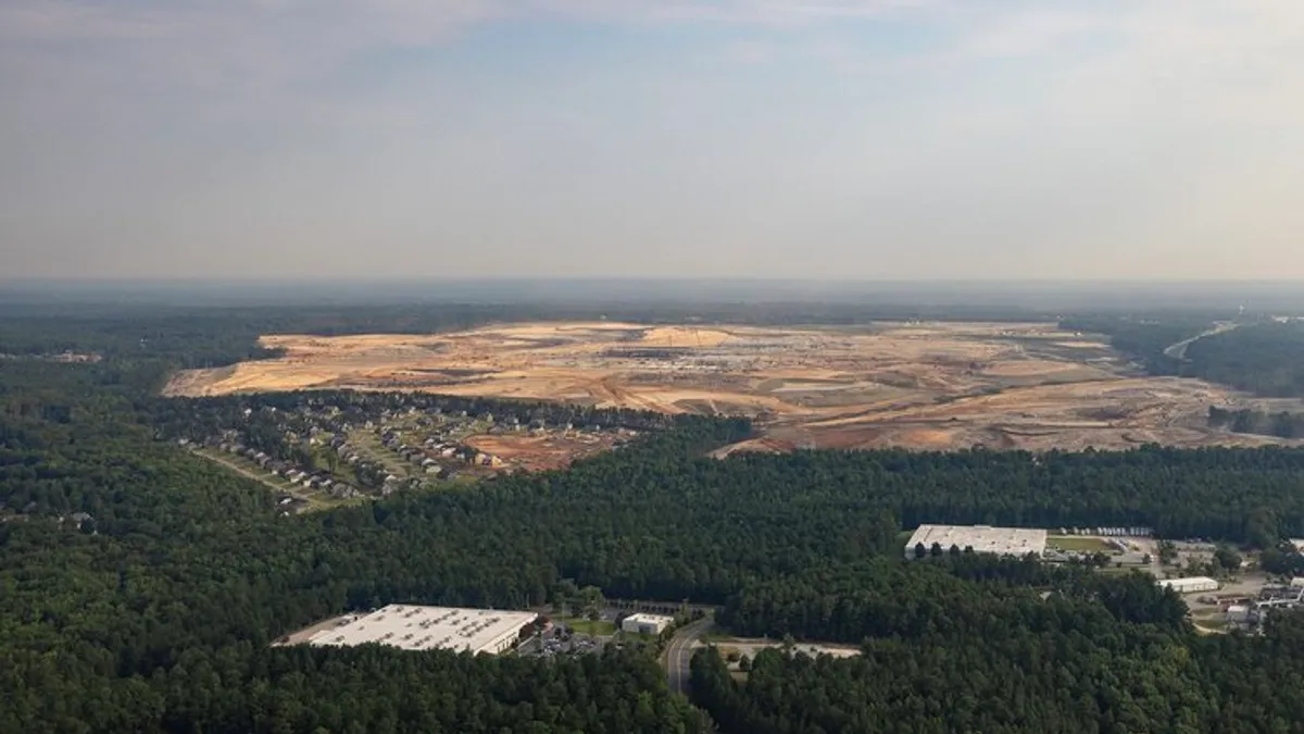 An aerial view of a jobsite under preparation for construction.