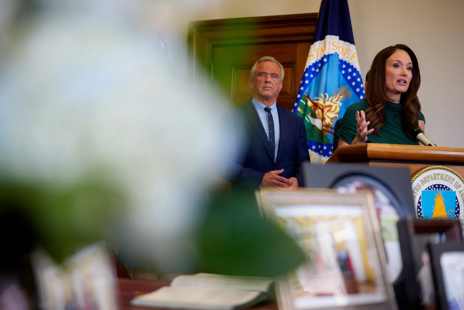 Two people standing next to each other at an event.