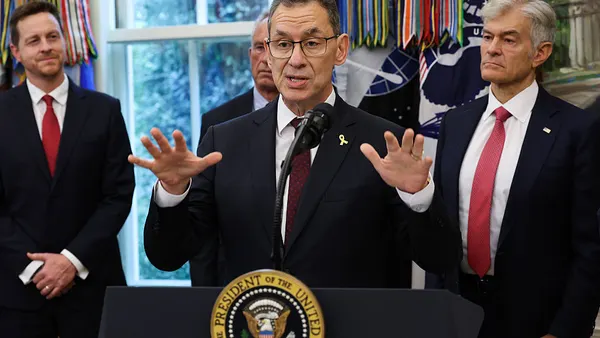 A photo of a man speaking