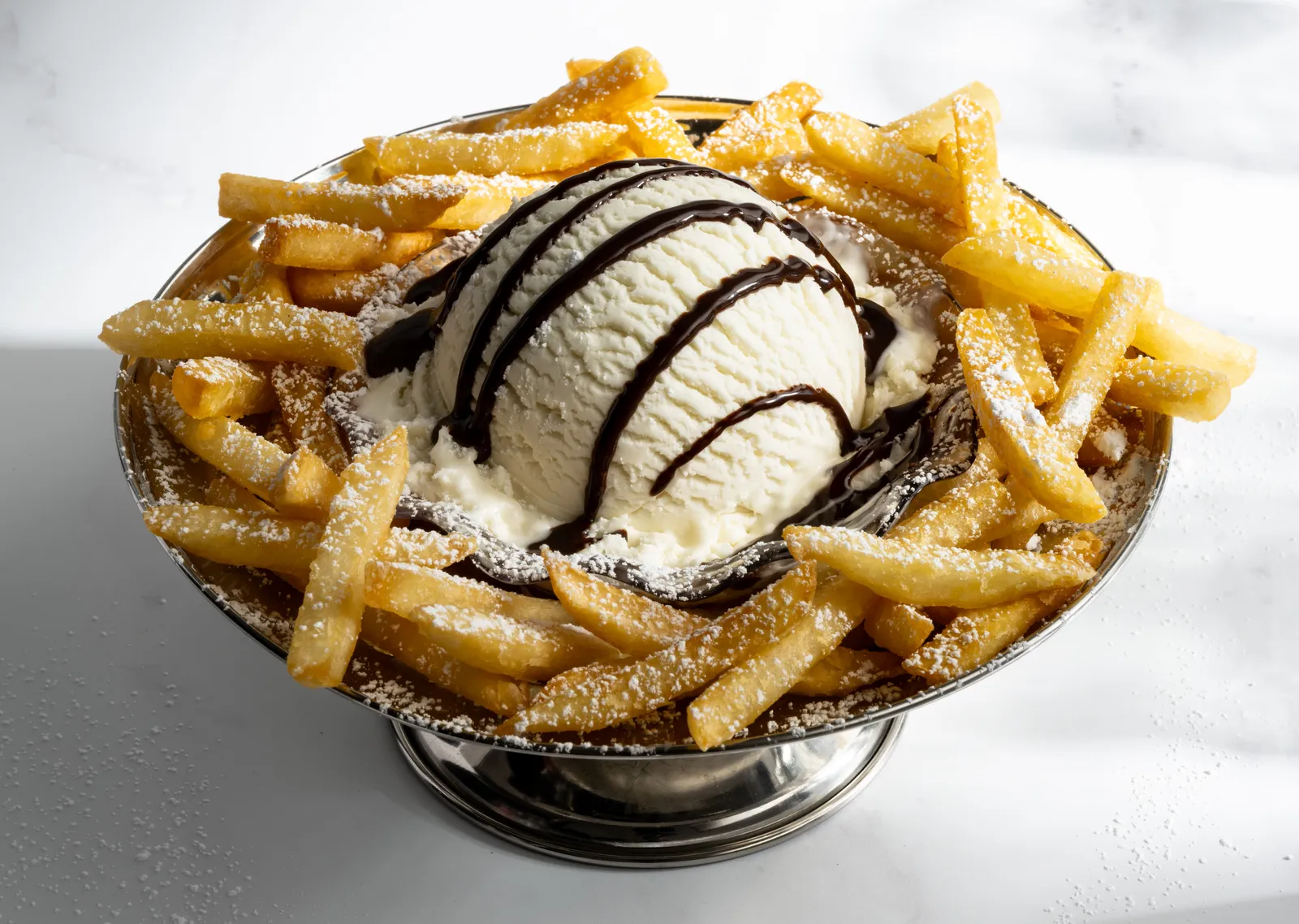 Friendly&#x27;s Fries n&#x27; Ice Cream Dipper is a big scoop of ice cream on a bed of fries.