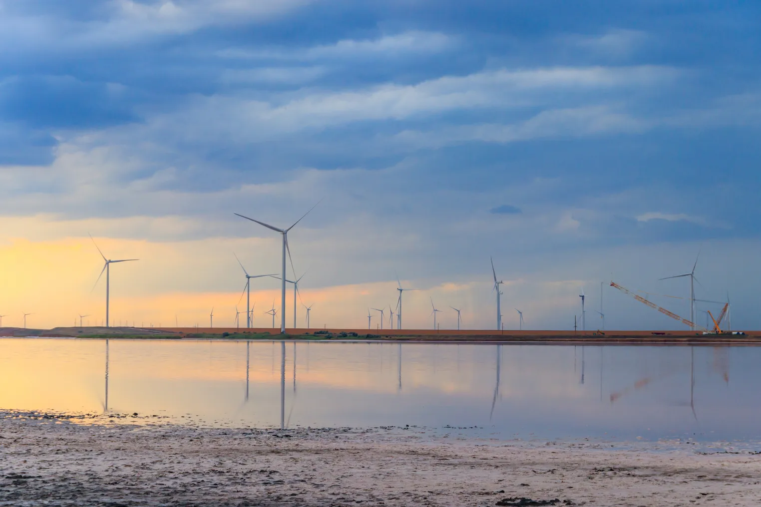 Building and assembling a construction wind turbines farm by a crane