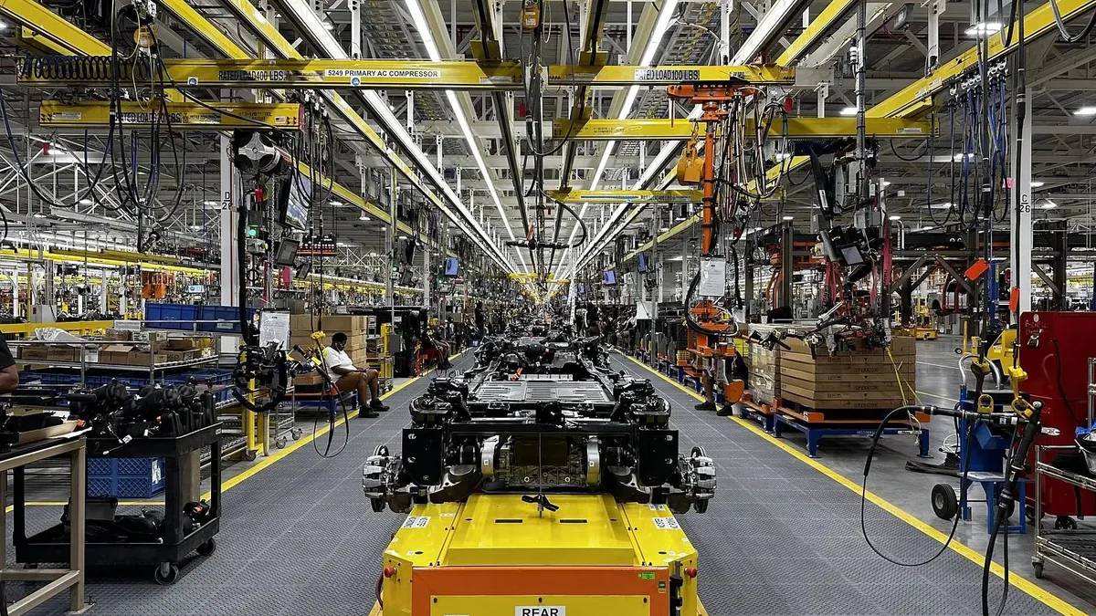 A Ford F-150 Lightning being assembled.