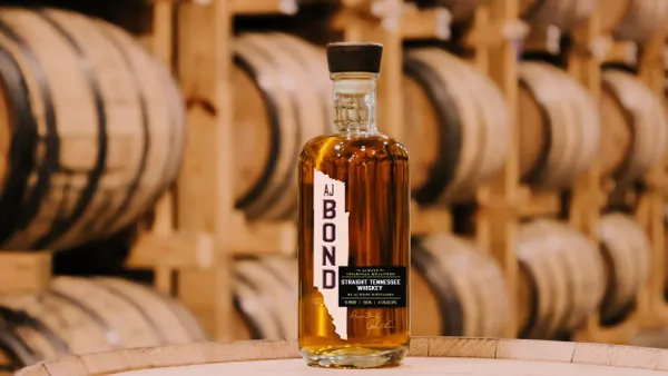 A bottle of AJ Bond Tennessee Whiskey.