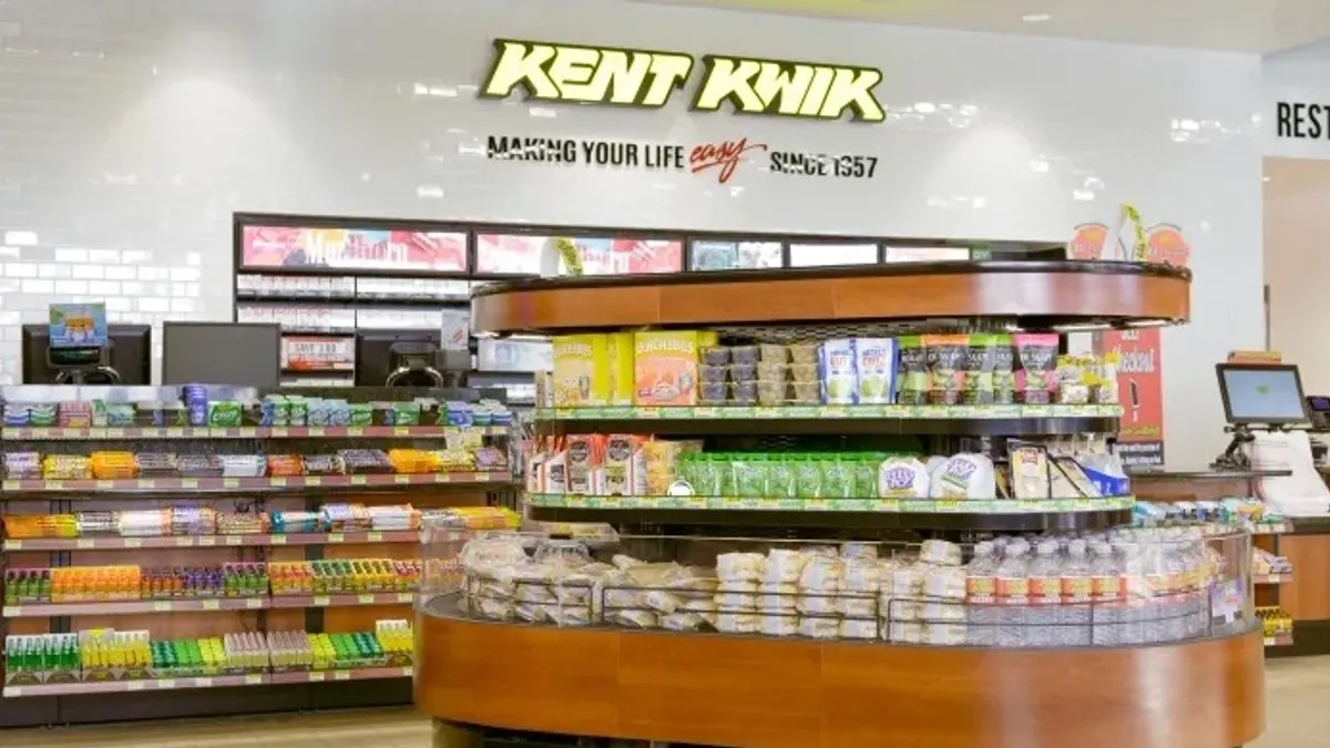 A photo of the interior of a Kent Kwik convenience store.