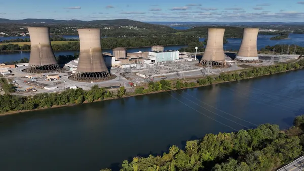 A nuclear power plant alongside a river.