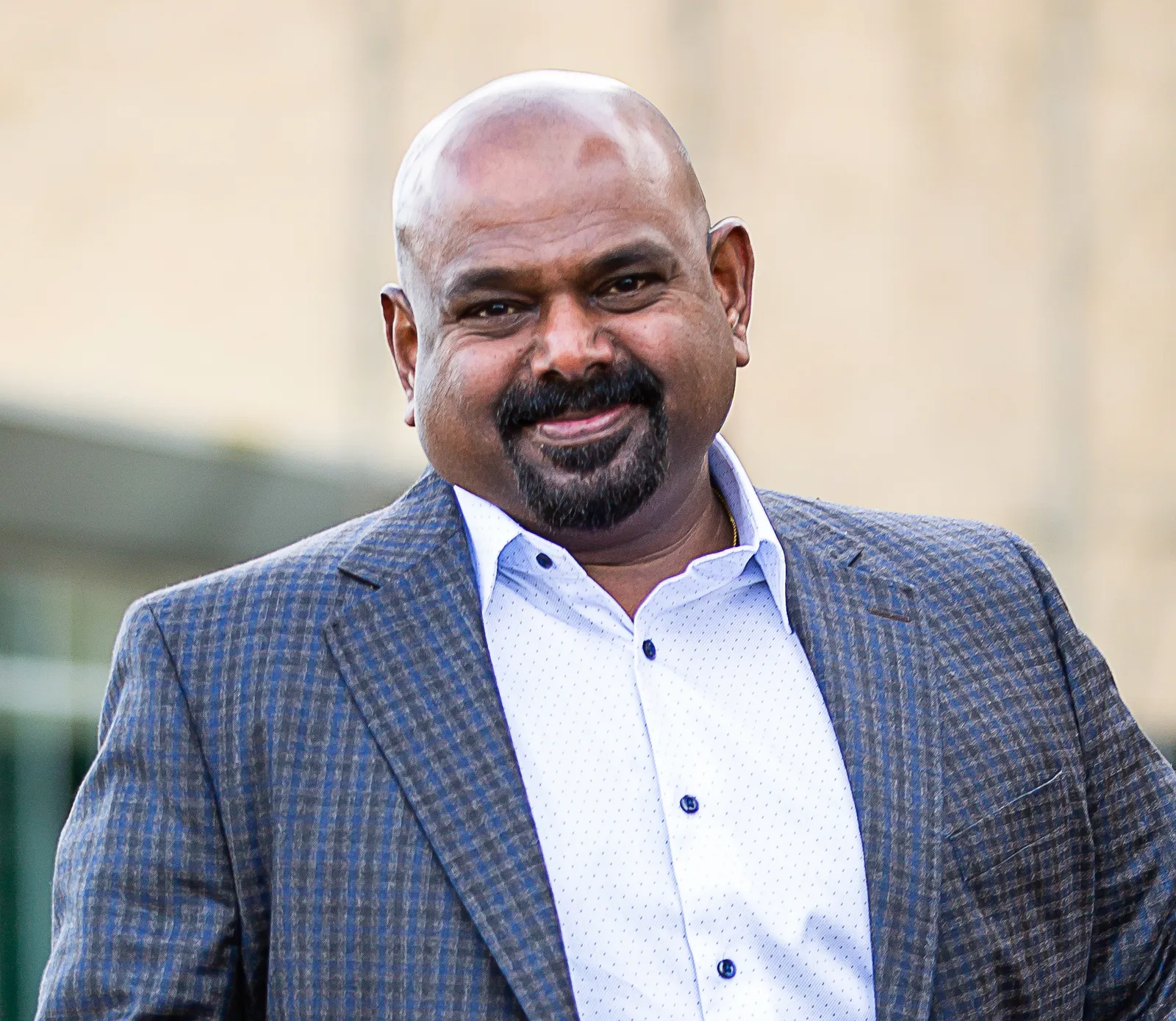 Headshot of Bobby Balachandran, president and CEO of Exterro