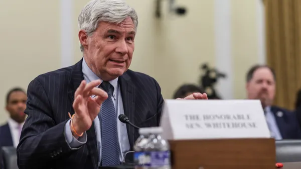 Senator seen participating in a discussion.