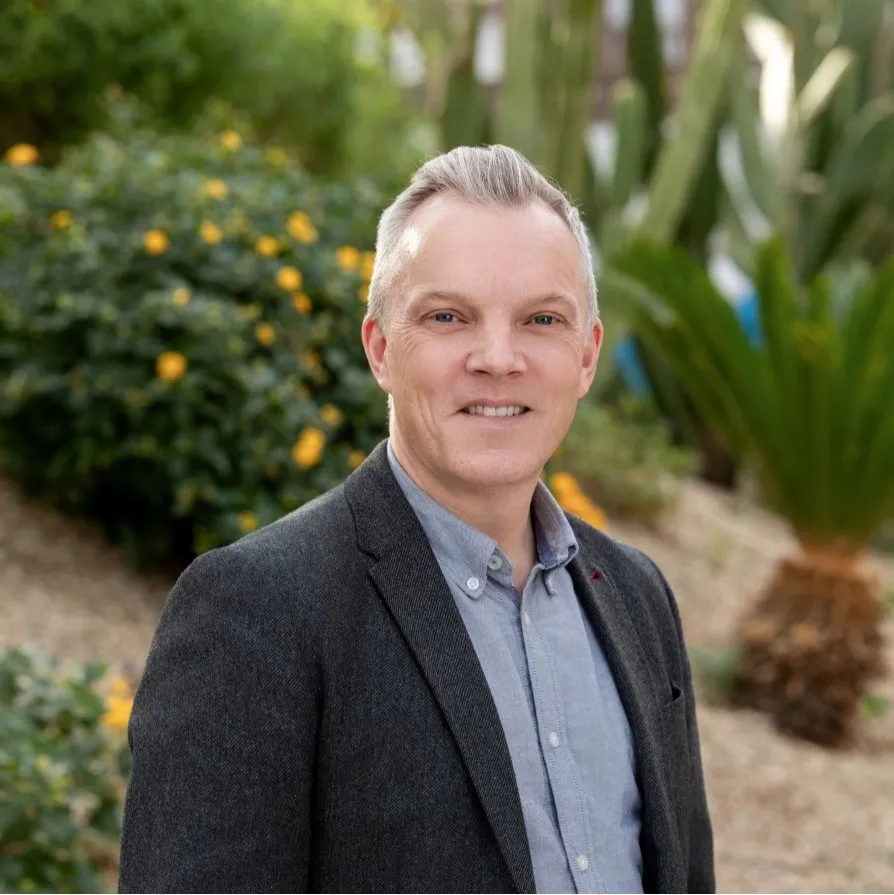 A portrait of Chris Boulton, the CEO of Prolynx.