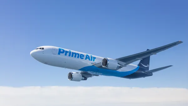 An Amazon airplane in flight.