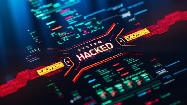 Computer motherboard with words "Caution: System Hacked"
