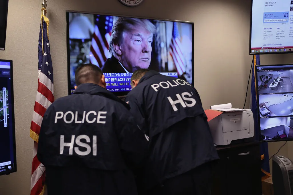 Ice agents work the investigation as a Donald Trump journalist played in the background