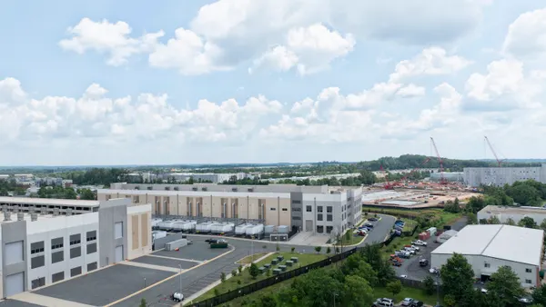Aerial view of a data center in Sterling, Virginia and a new data center being constructed in the background.