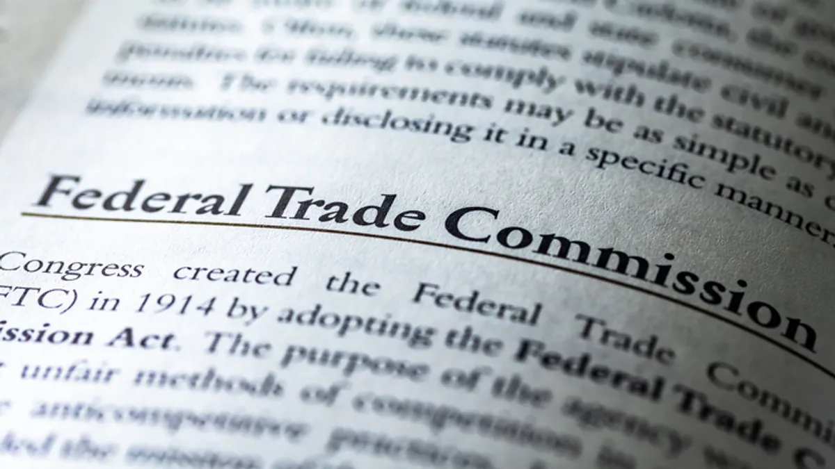 antitrust enforcement, FTC commissioners