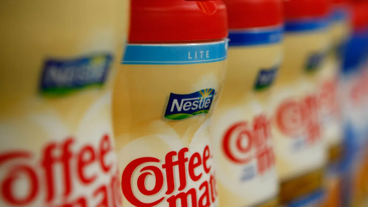 Containers of Nestle Coffee Mate coffee creamer are displayed on the shelf at the Marina Supermarket in San Francisco, California.