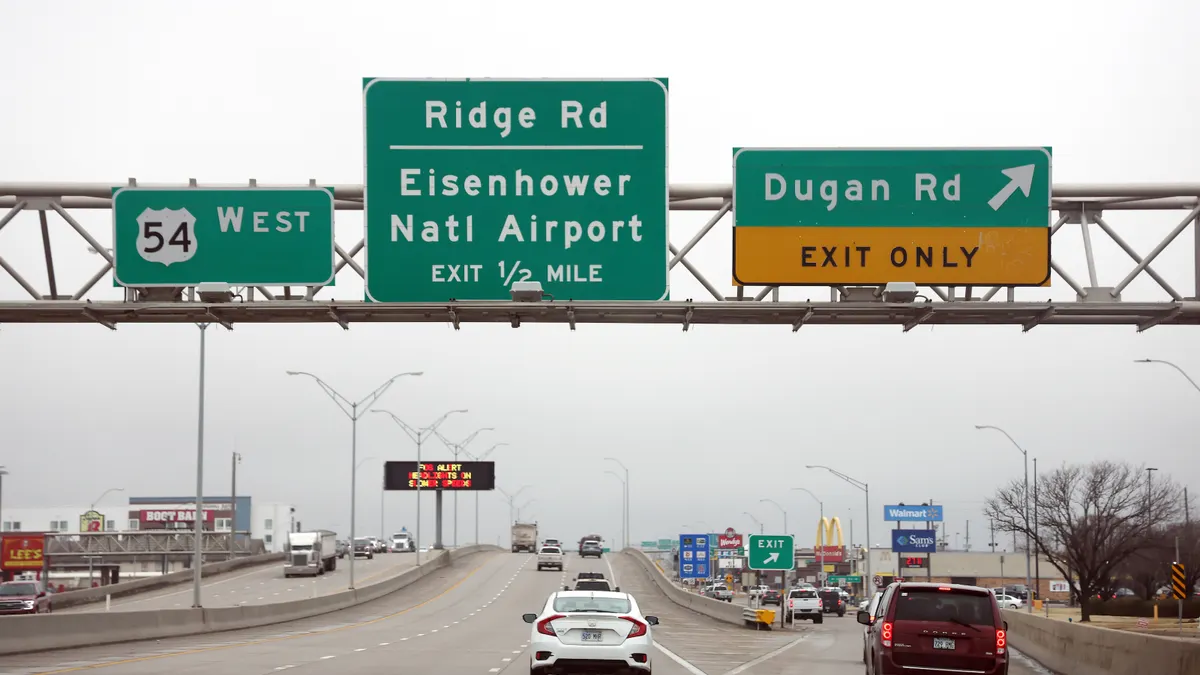 A highway exit sign is seen at the Dwight D. Eisenhower National Airport in Wichita, Kansas