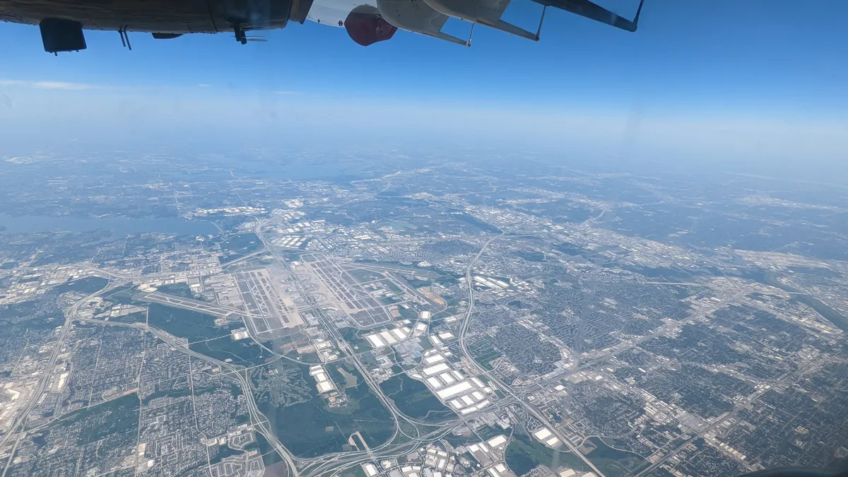 Bird's-eye view of the ground from an aircraft