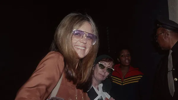 gloria steinem gets out of the car