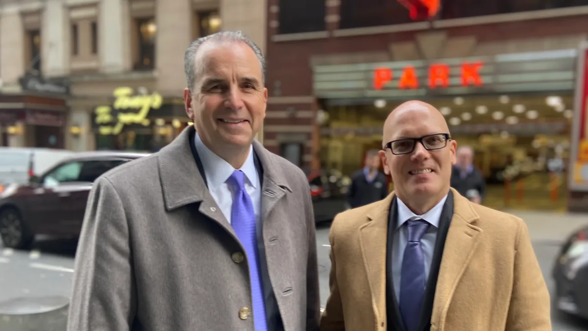 CEO Peter Arduini (L) and CFO Helmut Zodl (R) of GE Healthcare after a presentation to investors at Times Square in New York City.