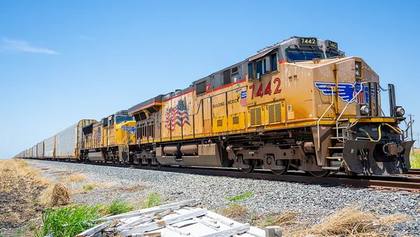 A Union Pacific freight train travels.