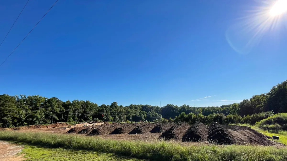 A series of long mounds of earthen material