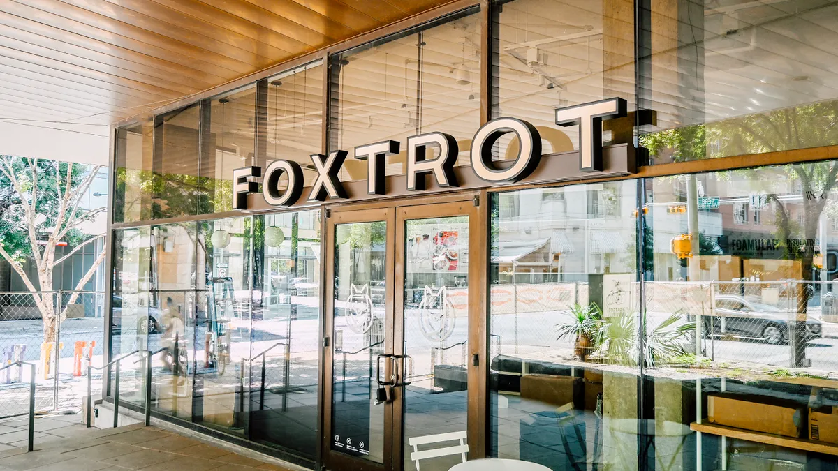 A photo of the exterior of a Foxtrot opening in July in Austin City Hall.