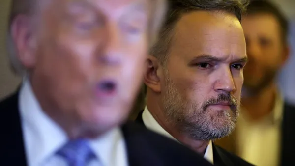 U.S. Trade Representative Jamieson Greer stands behind President Donald Trump