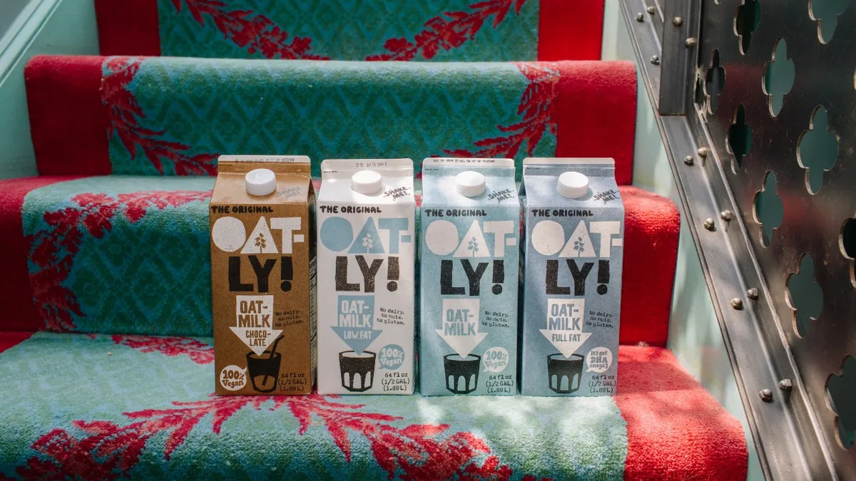 Oatly cartons on steps