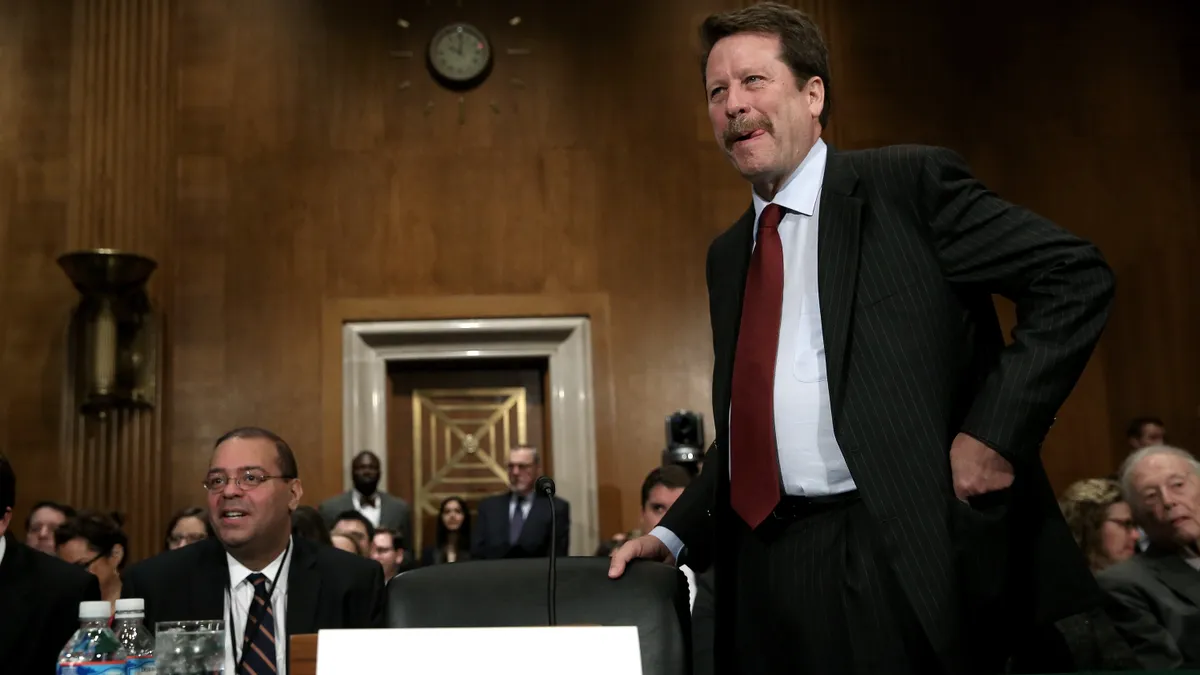 Dr. Robert Califf stands during a congressional hearing