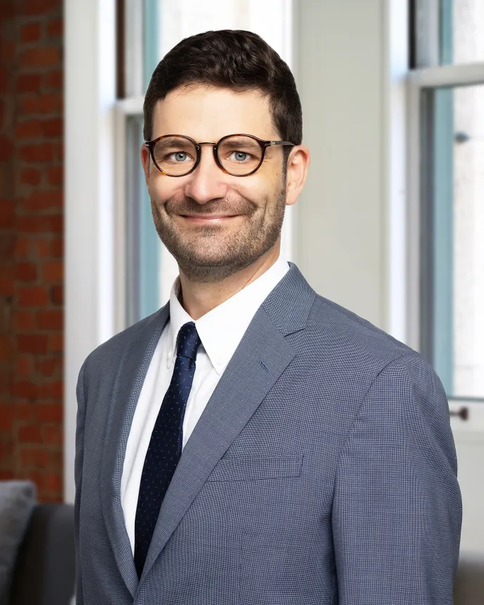 A headshot of Benjamin R. Buchwalter.