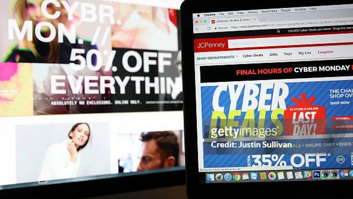 A photo illustration of an ad seen on the JCPenney website for a Cyber Monday sale is displayed on laptop computers.