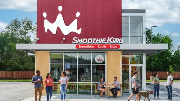 A rendering of a building prototype that is red and beige with Smoothie King sigange
