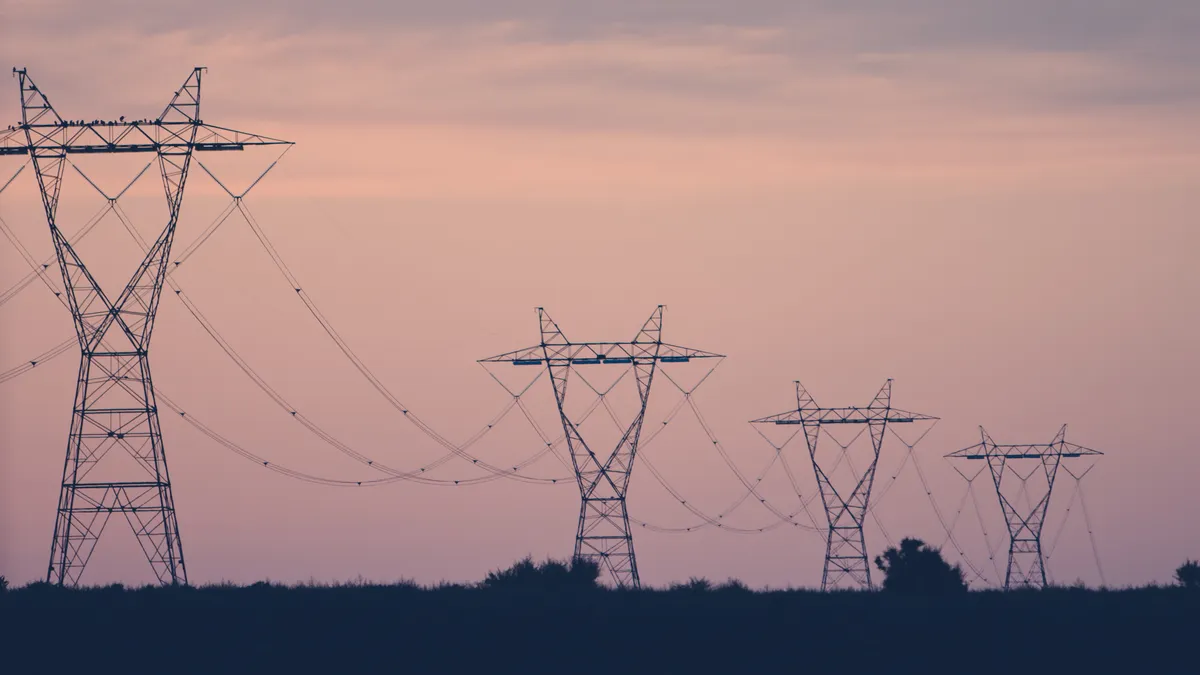 Industrial power lines stretching across the Idaho desert